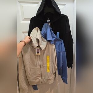 DKNY Hoodie in Black, Tan, Or Blue, 2 Sizes Available.  Price Is For 1 Hoodie